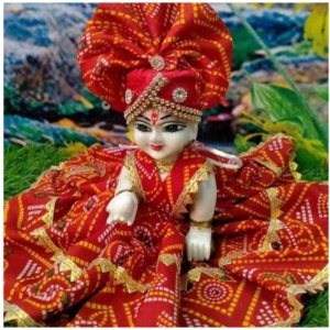 yellow–orange festive laddu gopal poshak with decorative borde